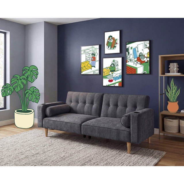 sofá cama makora merlak oxford velvet 3 posiciones con soft foam reclinable, frontal centrado de sofá color Oxford en tela velvet con respaldo dividido y botones, tres posiciones independientes (recto, reclinado, cama) y mecanismo reclinable, apoyabrazos con portavasos ocultos y dos cojines tubulares decorativos incluidos; patas de madera, montaje en menos de 5 minutos sin herramientas, capacidad para 2 personas. Ideal también como sofá compacto para estudios o salas pequeñas.