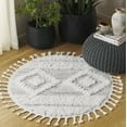 thumbnail image 2 of SAFAVIEH Moroccan Tassel Asteria Southwestern Shag Area Rug, Ivory/Beige, 4' x 4' Round, 2 of 11