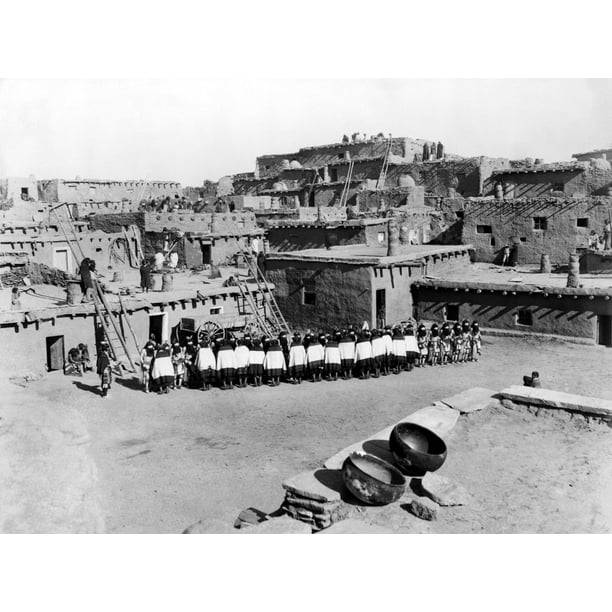 New Mexico Zuni Ceremony. /Nzuni Dancers In The Plaza Of A Pueblo Village In New Mexico