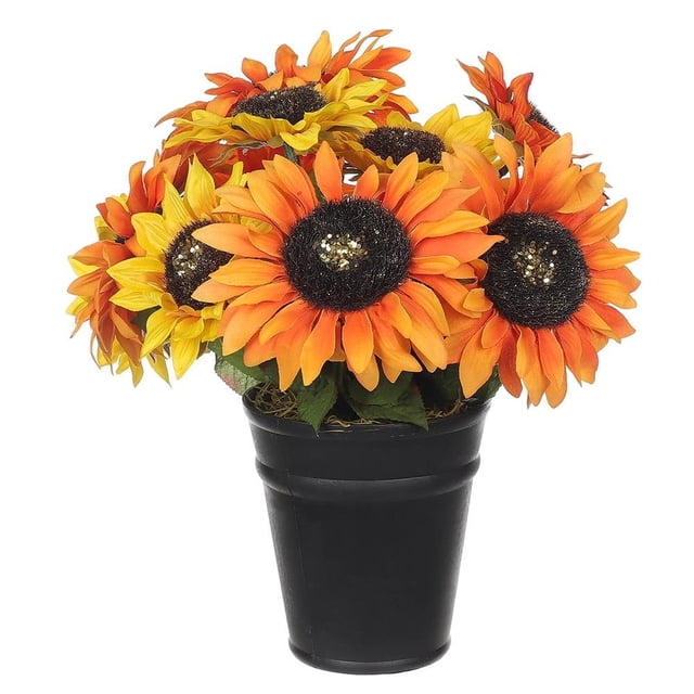 decoración de otoño way to celebrate planta en maceta de 16 pulgadas de altura arreglo artificial de girasoles naranja y amarillo en maceta negra, vista frontal centrada con follaje verde y centros marrón oscuro texturizados; ideal como centro de mesa de temporada o regalo decorativo.