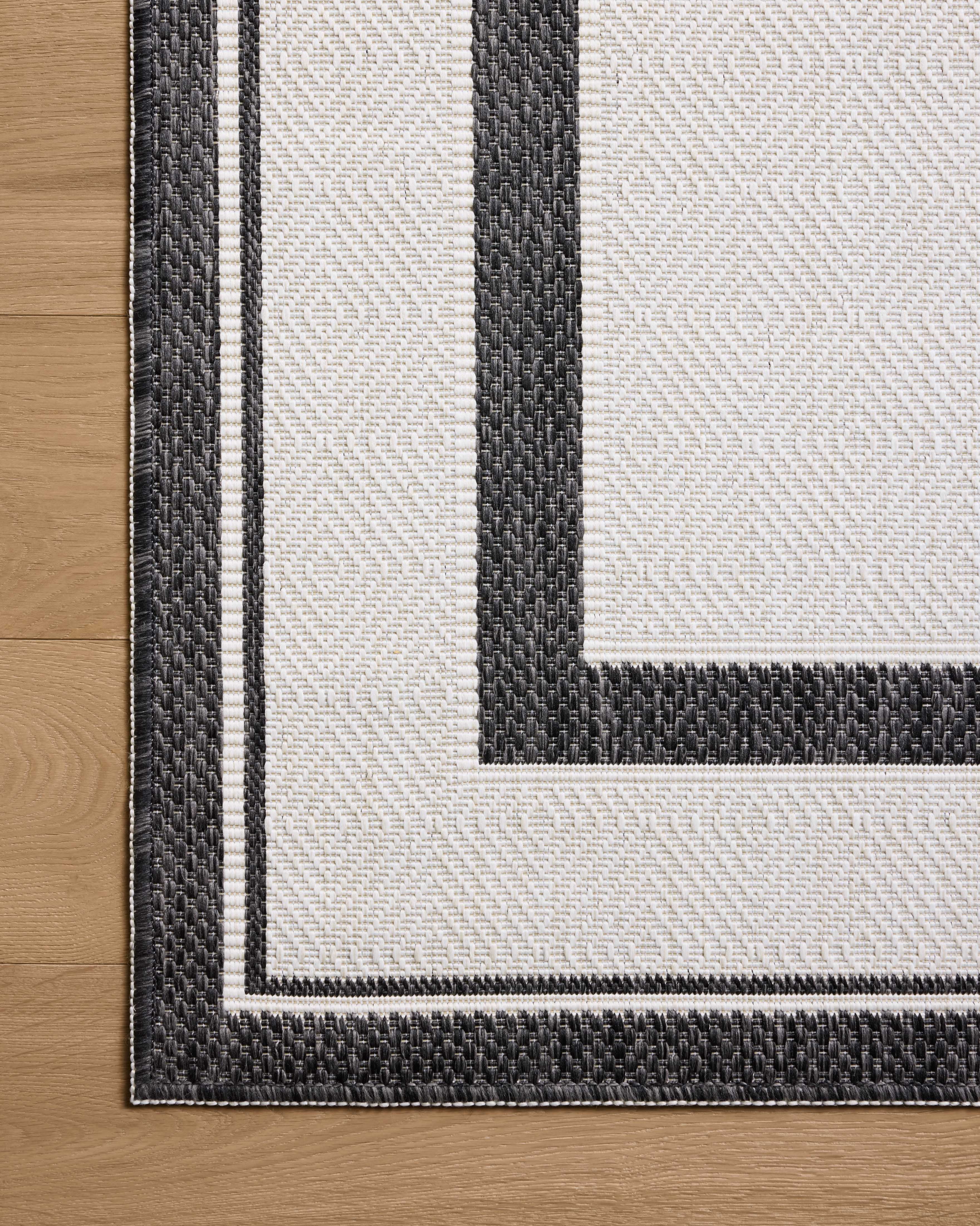 Indoor Outdoor Rug 7x9, Reversible, Loloi Easton Onyx / Ivory (6'7" x 9'4")