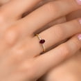 thumbnail image 4 of Gem Stone King 10K Yellow Gold Oval Red Rhodolite Garnet and White Lab Grown Diamond Engagement Ring for Women (0.55 Cttw, Oval 6X4MM, Gemstone January Birthstone, Available in Size 5, 6, 7, 8, 9), 4 of 6