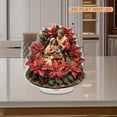 thumbnail image 4 of Rotating acrylic standee features the holy family surrounded by vibrant poinsettias and holly on a round base with stunning details, 4 of 7