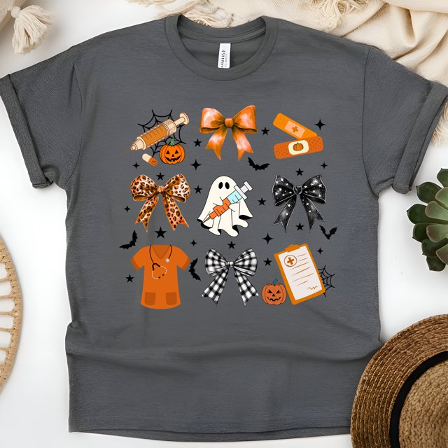 Nurse Graphic T-Shirt | Cute Ghost with Syringe and Bow Design Tee, Dark Heather, Size L