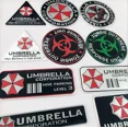 thumbnail image 4 of Adhesivo de aluminio 3D con logotipo de Umbrella Corporation para decoración de carrocería y maletero de Mercedes Benz, Chevrolet, JEEP, Seat y Mazda, 4 of 5