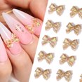 thumbnail image 2 of 50 Unids/Bolsa Bowknot Glitter Nail Art Decoración Arco Charm 3D Crystal Glow-In-Dark Designs DIY Accesorios De Uñas Gao Jinjia unisex, 2 of 2