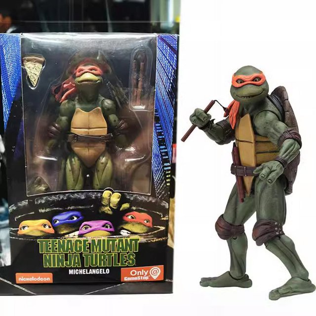 Teenage Mutant Ninja Turtles 1990 Movie Version TMNT Limited Edition 7-inch action figure model by Beaai. The PVC figure, standing 18cm tall, features Michelangelo with his signature orange mask and nunchaku weapons. The packaging includes a detailed display box measuring 14x7x21.5cm, showcasing the figure and accessories. Suitable for collectors and fans of the TMNT franchise.