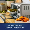 thumbnail image 4 of Oster Compact Countertop Oven With Air Fryer, Stainless Steel, 4 of 6