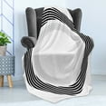 thumbnail image 4 of Spires Soft Flannel Fleece Throw Blanket, Abstract Circular Element with Interlace Spinning Concentric Rings Simplistic Artwork, Cozy Plush for Indoor and Outdoor Use, 70" x 90", Black, by Ambesonne, 4 of 5