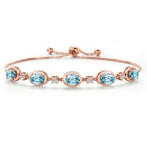Gem Stone King 18K Rose Gold Plated Silver Blue Zircon Bracelet for Women | 6.25 Cttw | Gemstone Birthstone | Oval 7X5MM | Fully Adjustable 9 inch