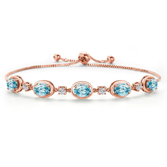 Gem Stone King 18K Rose Gold Plated Silver Blue Zircon Bracelet for Women | 6.25 Cttw | Gemstone Birthstone | Oval 7X5MM | Fully Adjustable 9 inch