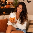 thumbnail image 1 of Cuenco de dulces con forma de calabaza fantasma: decoración de Halloween con un fantasma amigable sosteniendo un cuenco temático para dulces, almacenamiento pequeño o un lindo adorno de mesa., 1 of 7