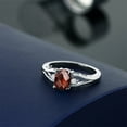 thumbnail image 4 of Gem Stone King 925 Sterling Silver Red Garnet and White Lab Grown Diamond 3 Stone Engagement Ring for Women | 1.61 Cttw | Oval Checkerboard 8X6MM | Round 2MM | Gemstone January Birthstone | Size 5, 4 of 4