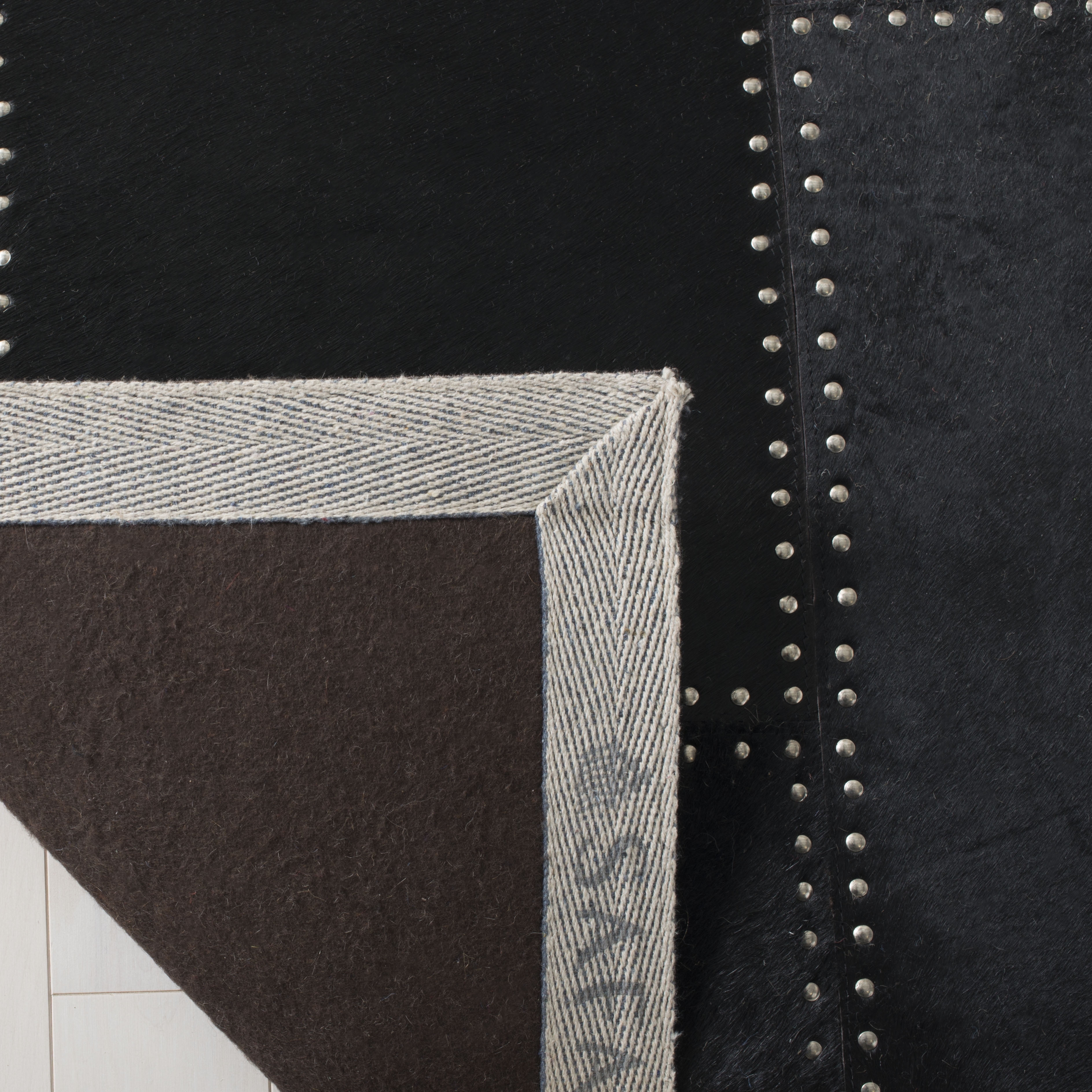 SAFAVIEH Studio Leather Juniper Geometric Area Rug, Black, 8' x 10'
