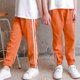 thumbnail image 1 of Pantalones deportivos a rayas para niños de 2 a 12 años, 1 of 2