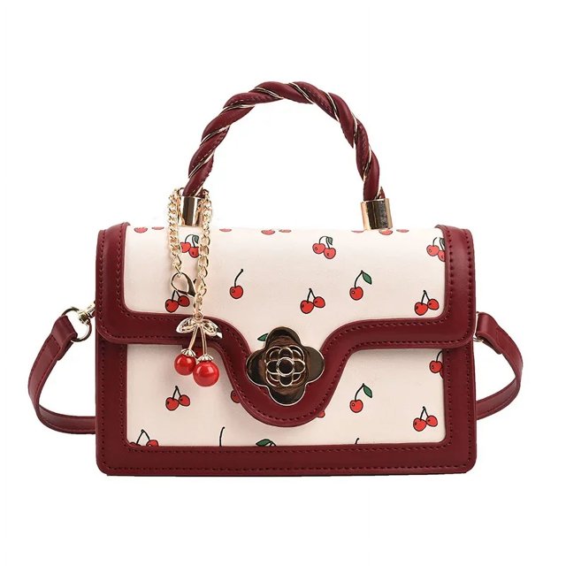Este es un bolso rojo con un lindo diseño de cereza para citas e compras.