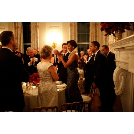 President Obama Pulls Out The Chair For Michelle Obama At The White House Governors Ball. California Governor Arnold