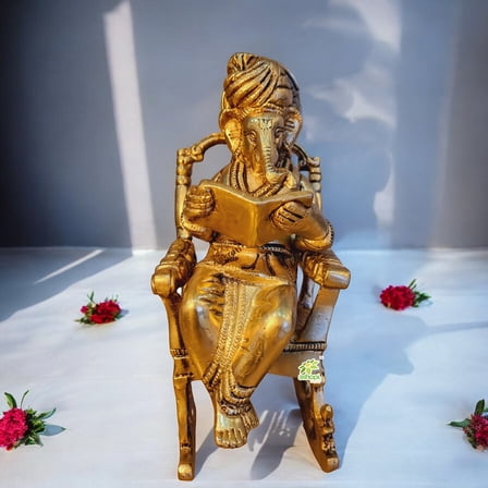 Ashopi Decor Lord Ganesha Statue Sitting On A Chair And Reading A Book Decorative Showpiece - 19 cm (Brass, Brown)