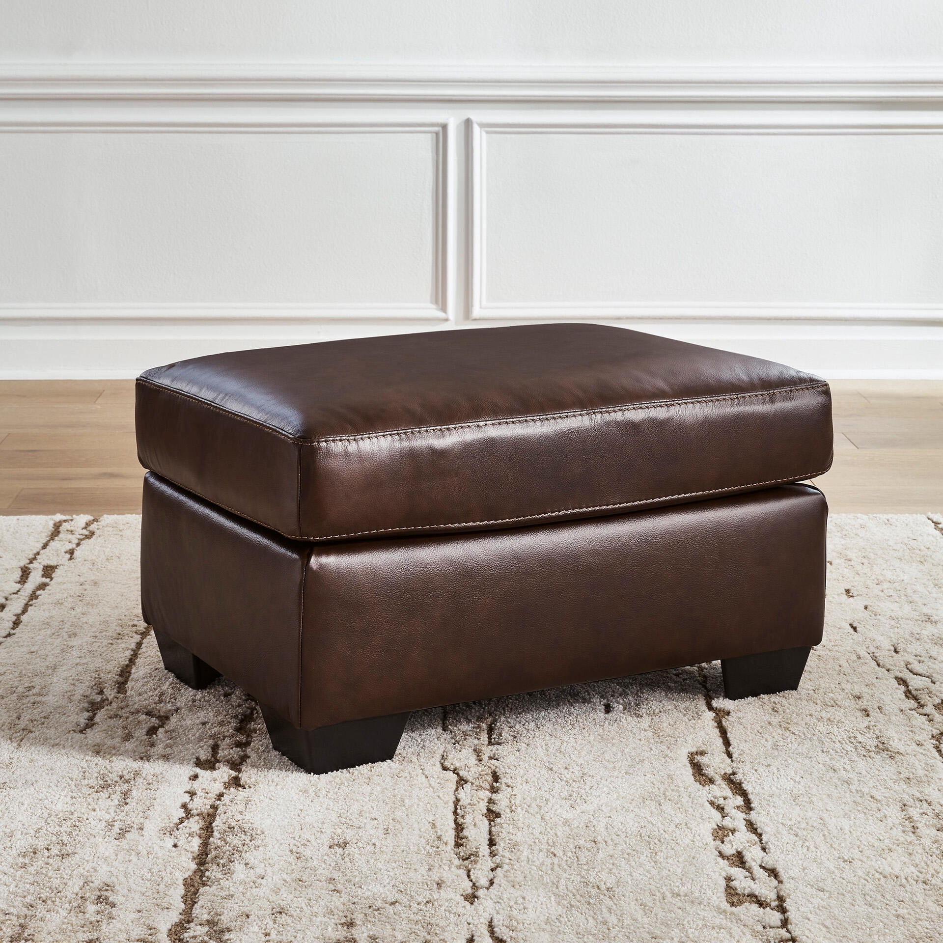 Signature Design by Ashley Santorine Leather Ottoman in Dark Brown