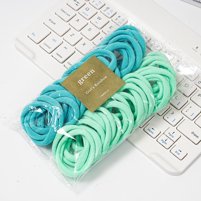 Anillo de toalla enlatado de color caramelo de 50 unidades, anillo para el cabello sin costuras y de alta elasticidad