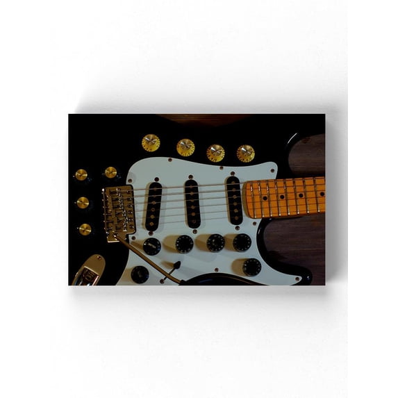 Electrick Guitar Strings Wrapped Canvas -Image by Shutterstock,