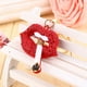 thumbnail image 4 of Llavero Jadeshay Metal Rojo Forma de Labio, 4 of 11