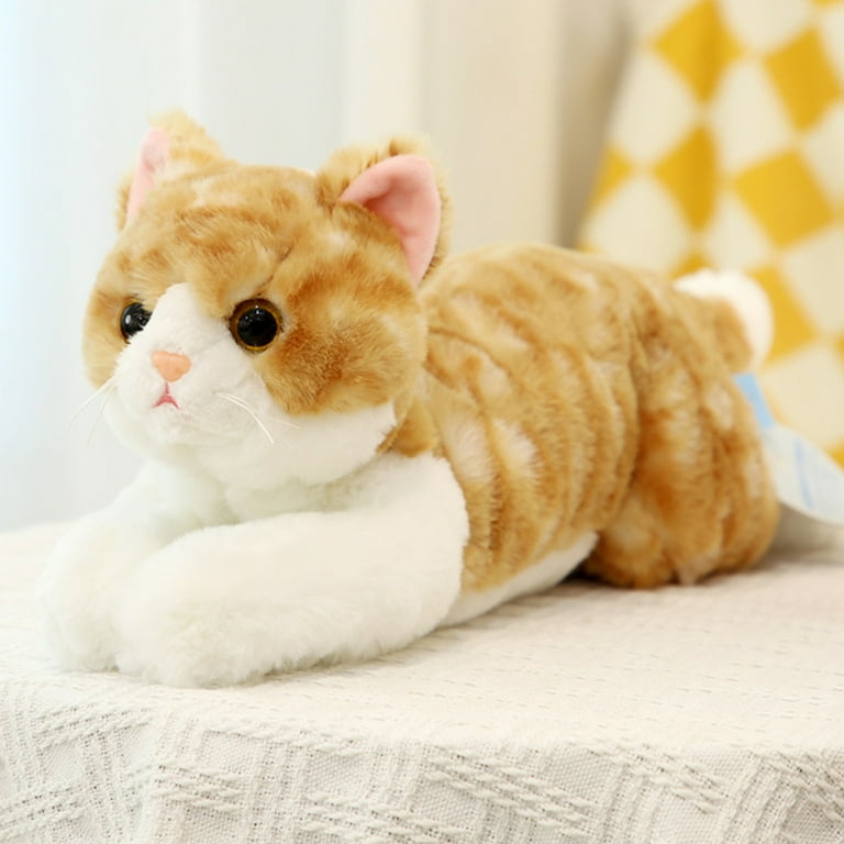 Cat hugging deals stuffed animal