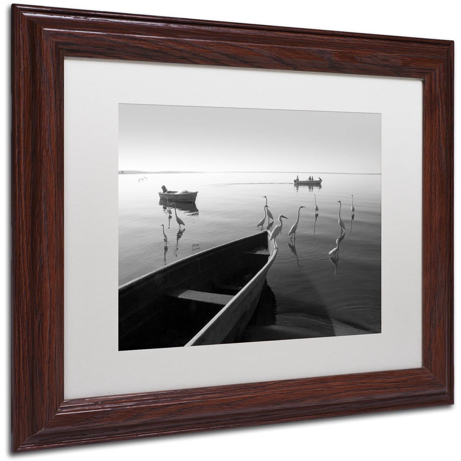Trademark Fine Art "Herons and 3 Boats" Canvas Art by Moises Levy White Matte, Wood Frame