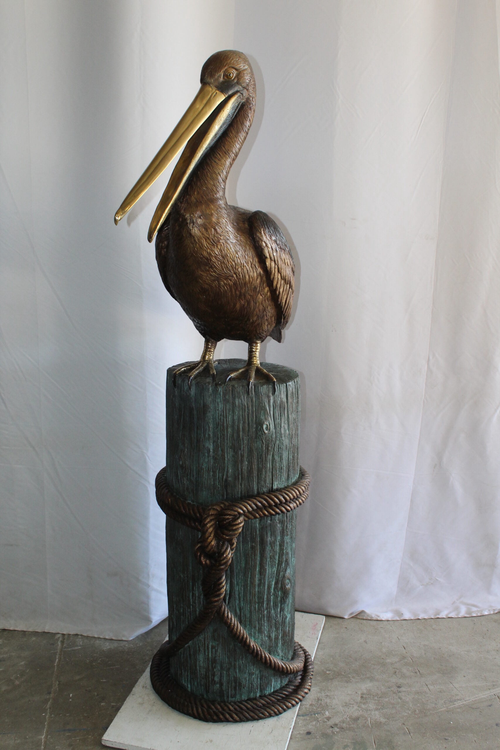 Nifao Pelican Outdoor Fountain Statue Mounted on Tree Stump, Lifesize Bronze Garden Water Feature for Patio & Yard – Garden Outdoor Decor Sculpture, 33"L x 23"W x 73"H