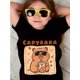 thumbnail image 1 of Adorable camiseta infantil con dibujo de capibara y té con leche: algodón suave y cómodo, manga corta, cuello redondo, top informal de verano en rosa con un oso juguetón., 1 of 6