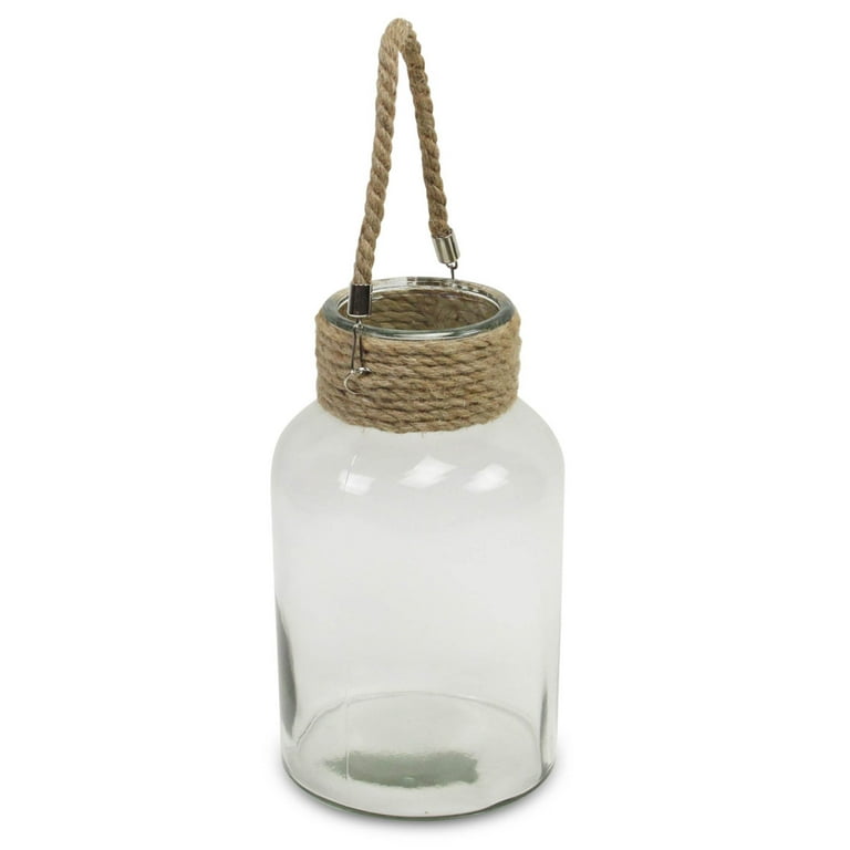 A wonderfully designed elegant glass jar with coir husk outings, made out  of artisians, completely handmade