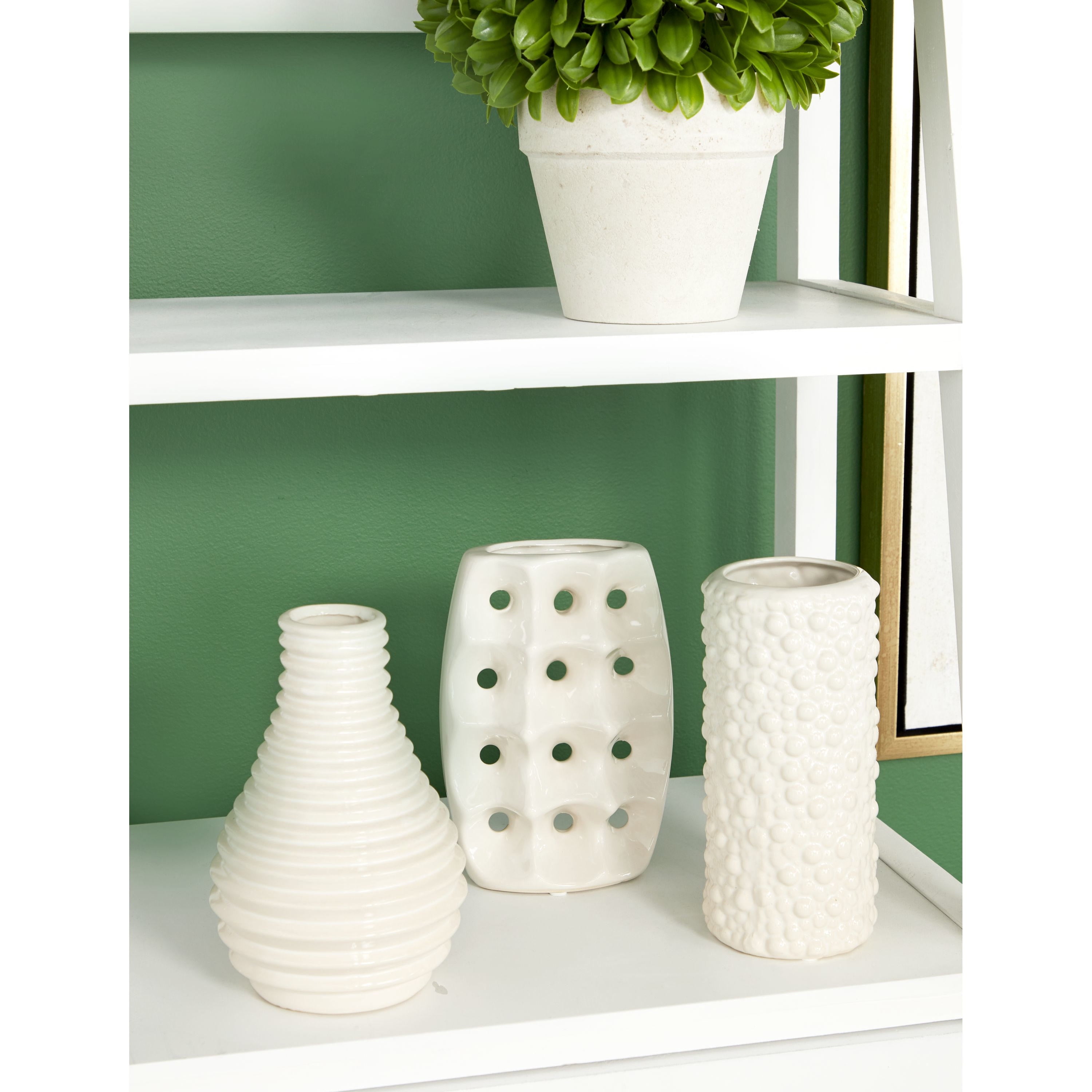 CosmoLiving by Cosmopolitan 5"W, 8"H White Ceramic Vase with Varying Patterns, Set of 3