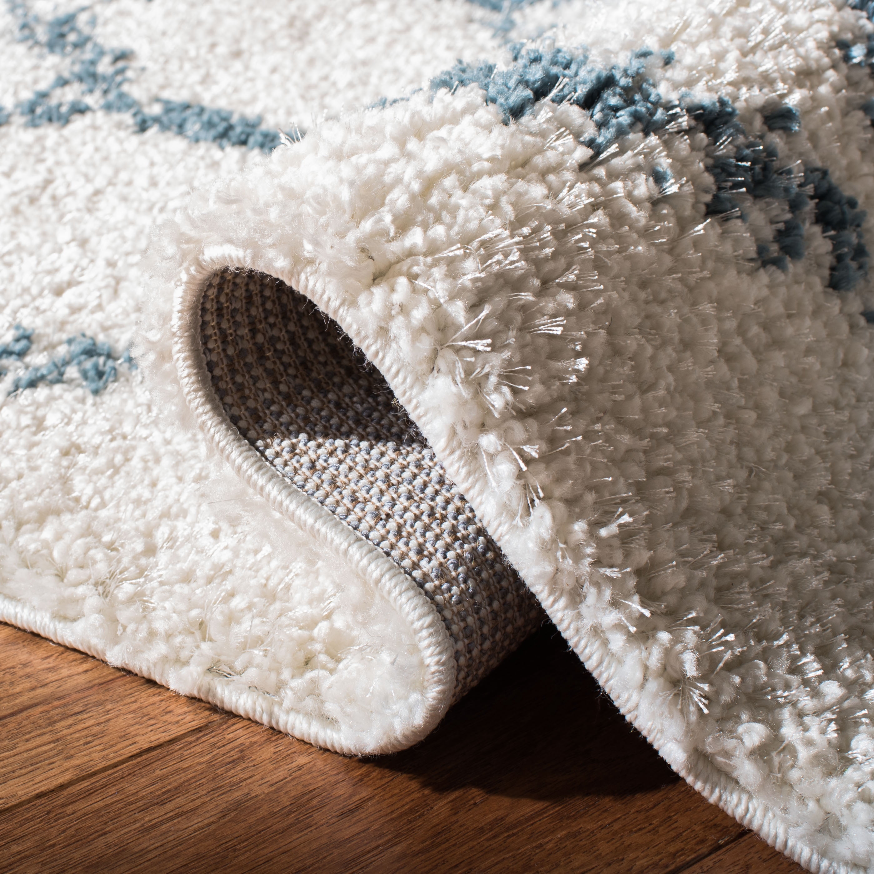 SAFAVIEH Berber Fringe Amable Geometric Shag Area Rug, Cream/Blue, 9' x 12'