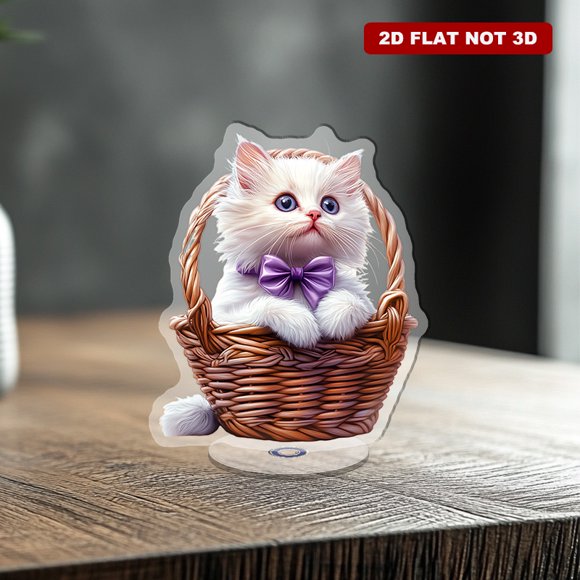 Rotating acrylic ornament featuring a translucent Victorian prism with a brown basket and a Persian cat adorned with a purple bow collar