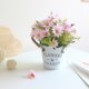 thumbnail image 5 of Cubo de hierro con cuerda de cáñamo y margaritas retro, simulación de planta de bonsái, artesanía de flores falsas, decoración con maceta, 5 of 6