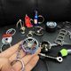 thumbnail image 2 of LLavero de afinación para coche, accesorio de modificación de culata, junta de motor, modelo de cadena, llavero de bicicleta, regalo para fanáticos de carreras F1, 2 of 4