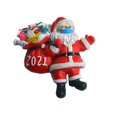 thumbnail image 1 of Estatua navideña pequeña de Papá Noel con mascarilla que lleva herramientas de limpieza, 1 of 5