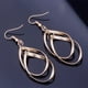 thumbnail image 3 of Jumpingount 1 par de pendientes retorcidos para mujer, pendientes de gota para la oreja de hoja hueca, regalos portátiles para esposa, novia, joyería de Ropa, zapatos y accesorios Miscelánea Oro Jumpingount PS6950-01, 3 of 6