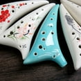 thumbnail image 2 of Ocarina 12 agujeros de cola deformada Ocarina de cerámica Alto C Instrumento musical pintado a mano con cordón de música Bolsa protectora para amantes de la música y estudiantes Tomshoo Ocarina, 2 of 6