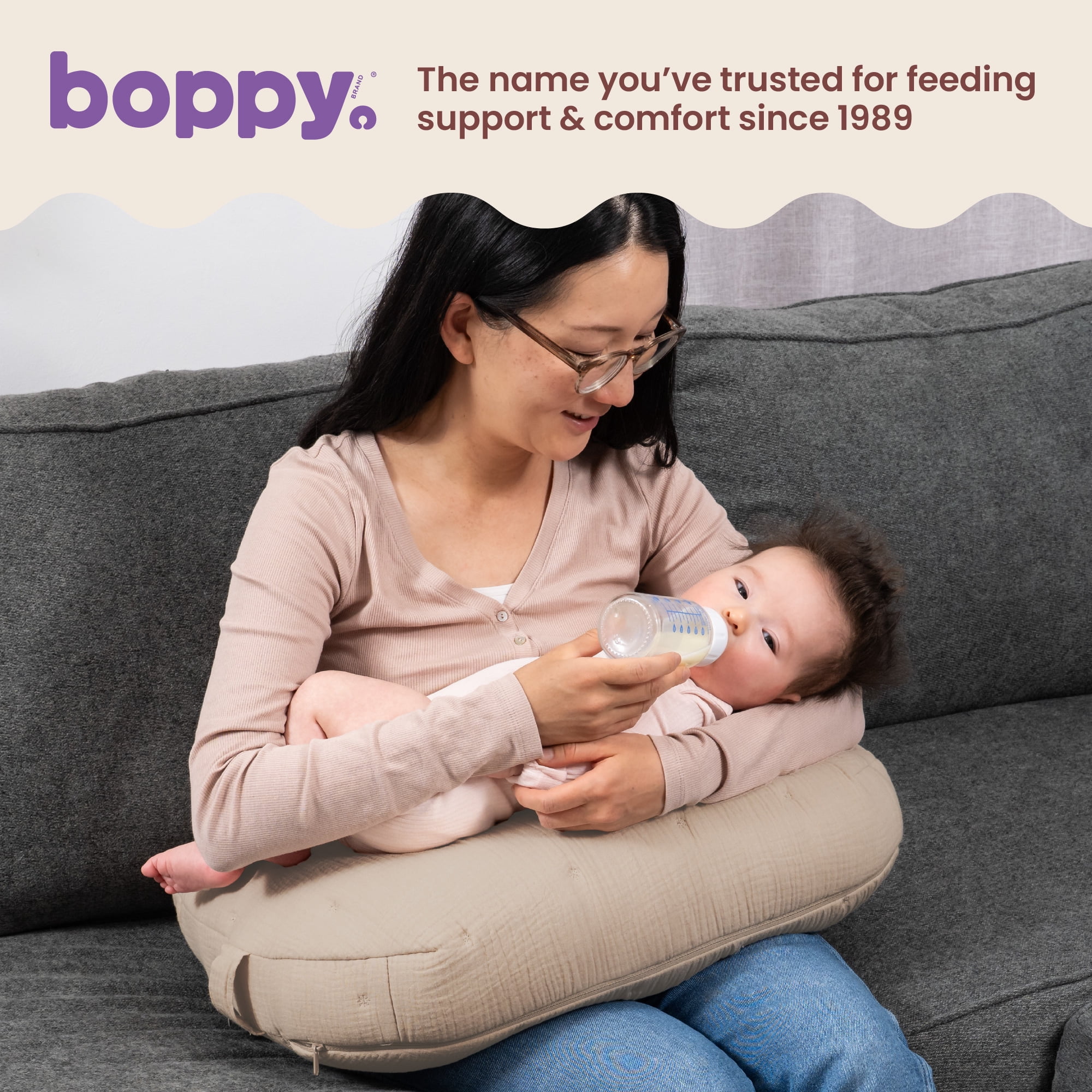Boppy Nursing Pillow Luxe - Ergonomic Bottle & Breastfeeding Pillow with High Lift & Firm Support - Water-Resistant with Washable Cotton Muslin Cover - Baby Safety Alliance Verified - Oatmeal