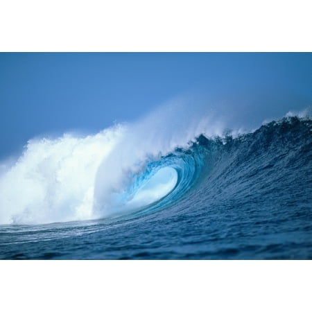 Hawaii Powerful Curling Wave Side Angle View Whitewash And Spray Blue Sky
