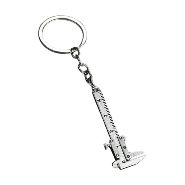 Mini metal móvil Vernier Caliper 3D Precisión móvil Costilla Pendiente portátil Modelo de regla Aleación creativa de zinc para hombres Mujeres