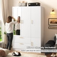 thumbnail image 5 of ANPOO Mid-Century Modern Fluted Bedroom Armoire, 3 Door Freestanding Wardrobe Closet with Mirrors, Motion Sensor LED Lights, 70.3" Tall Wooden Storage Cabinet with Drawers & Shelves, White, 5 of 9