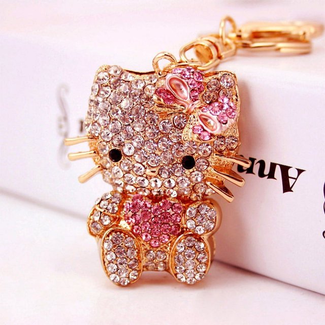 Llavero de cristal de Hello Kitty con forma de conejito, llavero brillante con diamantes de imitación, colgante de conejo, dijes para mujeres y niñas