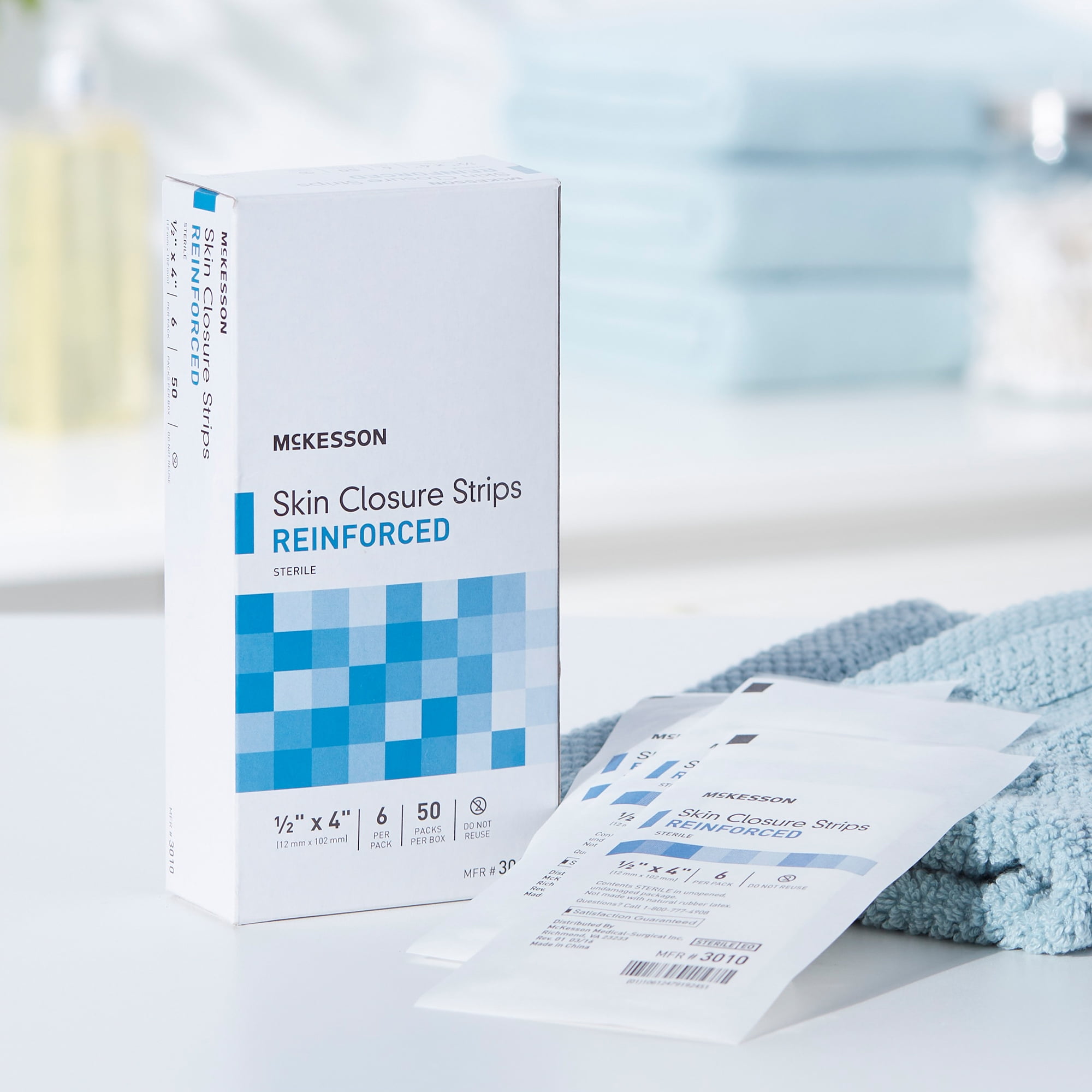 McKesson Skin Closure Strips - Sterile, Reinforced Wound Bandage, 1/2 in x 4 in, 50 Ct