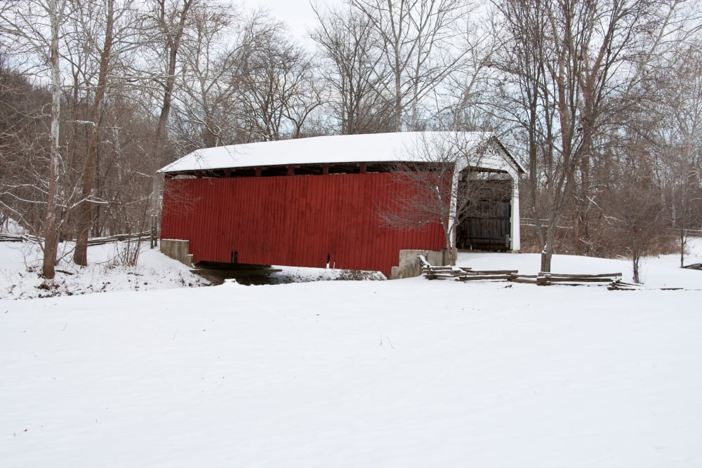 Covered bridge in snow covered forest Beeson Covered Bridge Billie ...