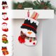 thumbnail image 1 of Calcetín Navideño con Decoración de Papá Noel | Bolsa de Regalo para Niños | Material: Poliéster | Color: Verde | Medidas: 19,5 X 14 X 4 Cm | Decoración Navideña Reutilizable y Festiva | Incluye 1 Bo, 1 of 6