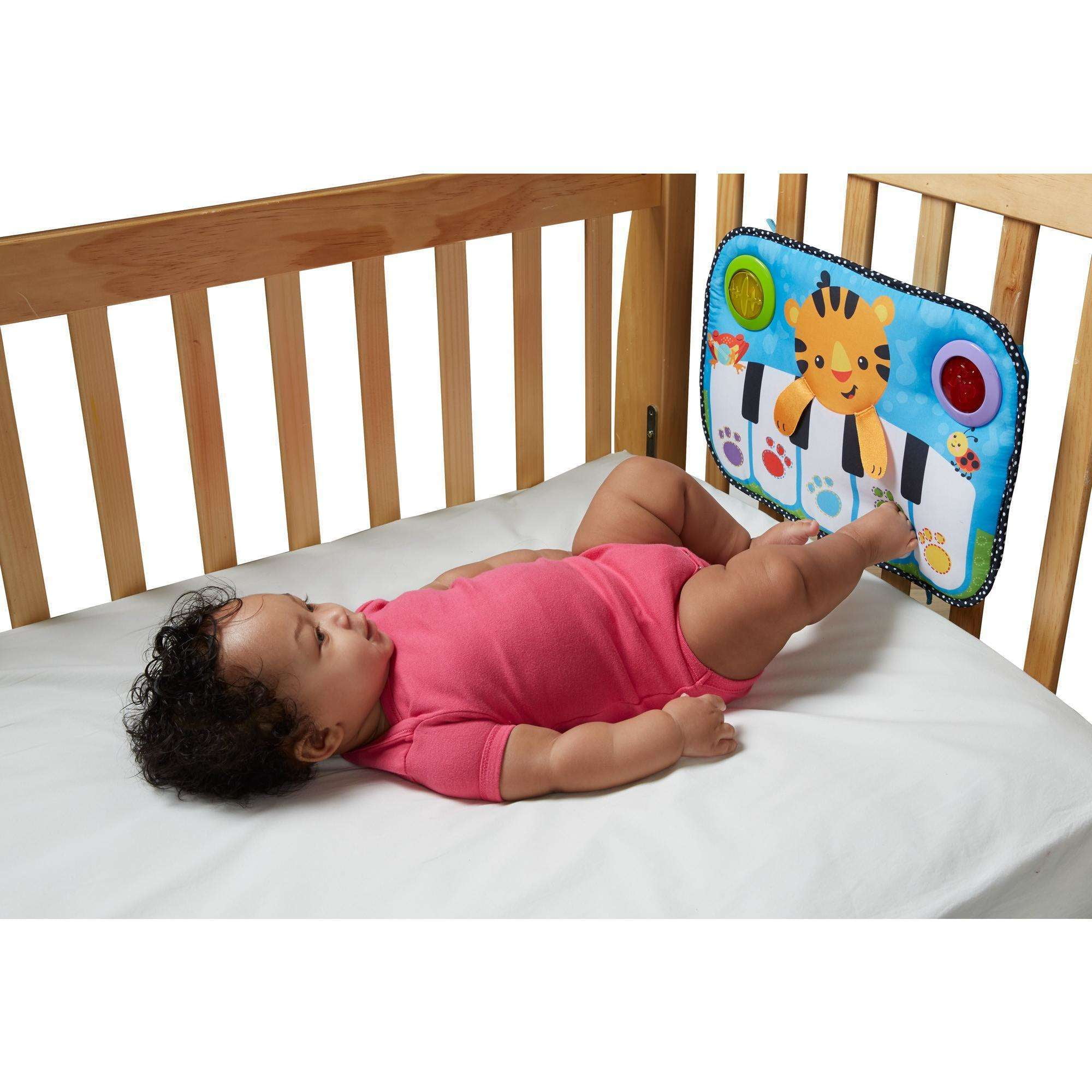 Fisher price kick and play piano best sale crib toy