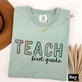 thumbnail image 1 of Comfort Colors® First Grade Teacher Shirt, Teach First Grade Shirt, Teacher Gift, Back to - Ivory - 3XL, 1 of 4
