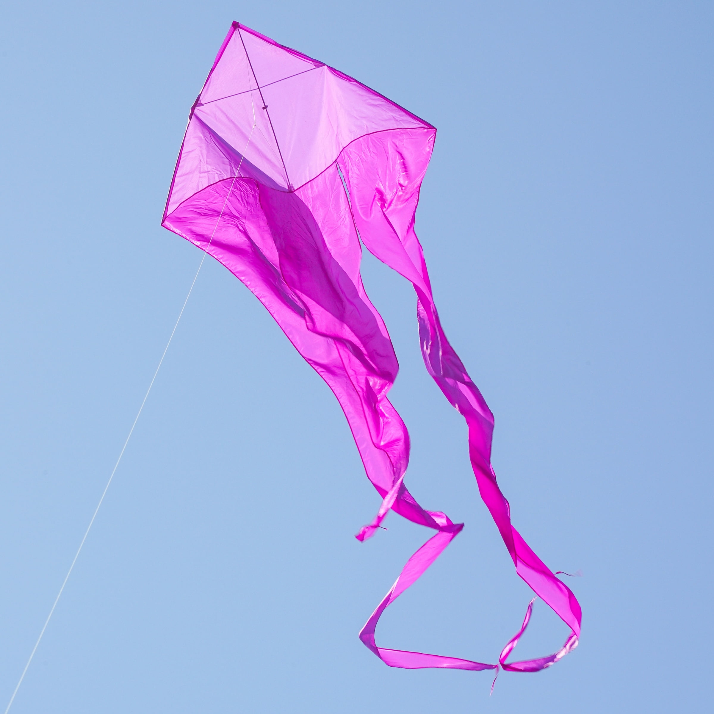 In the Breeze 3358 — Purple 52-inch Wave Delta Kite — Large Solid Color Easy-Flying Kite with Long Flowing Taffeta Tails